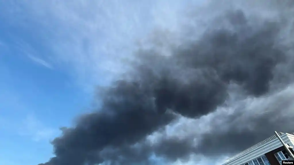 Black smoke rising into the sky after a long-range strike