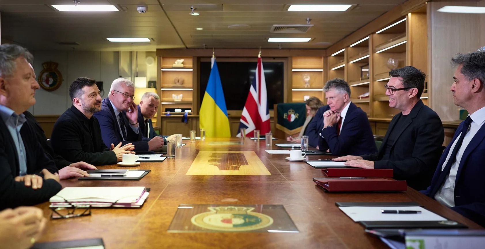 Ukrainian and British delegations hold bilateral talks in a meeting room aboard HMS Queen Elizabeth