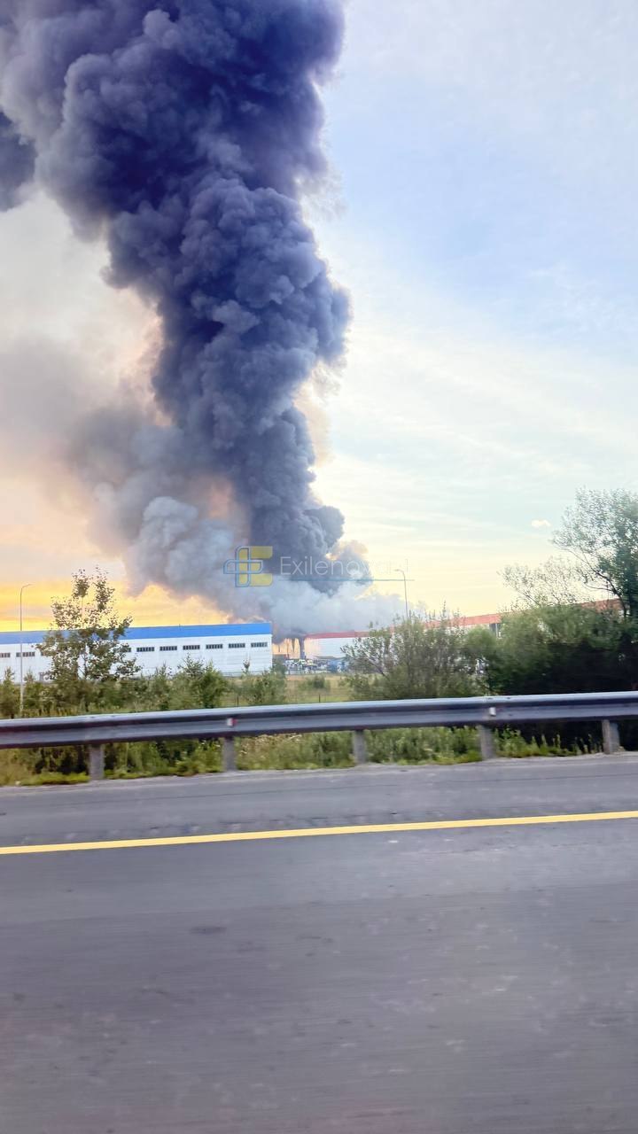 Fire at the Yuzhnye Vorota logistics park warehouse near Belye Stolby after a drone strike, July 20, 2026