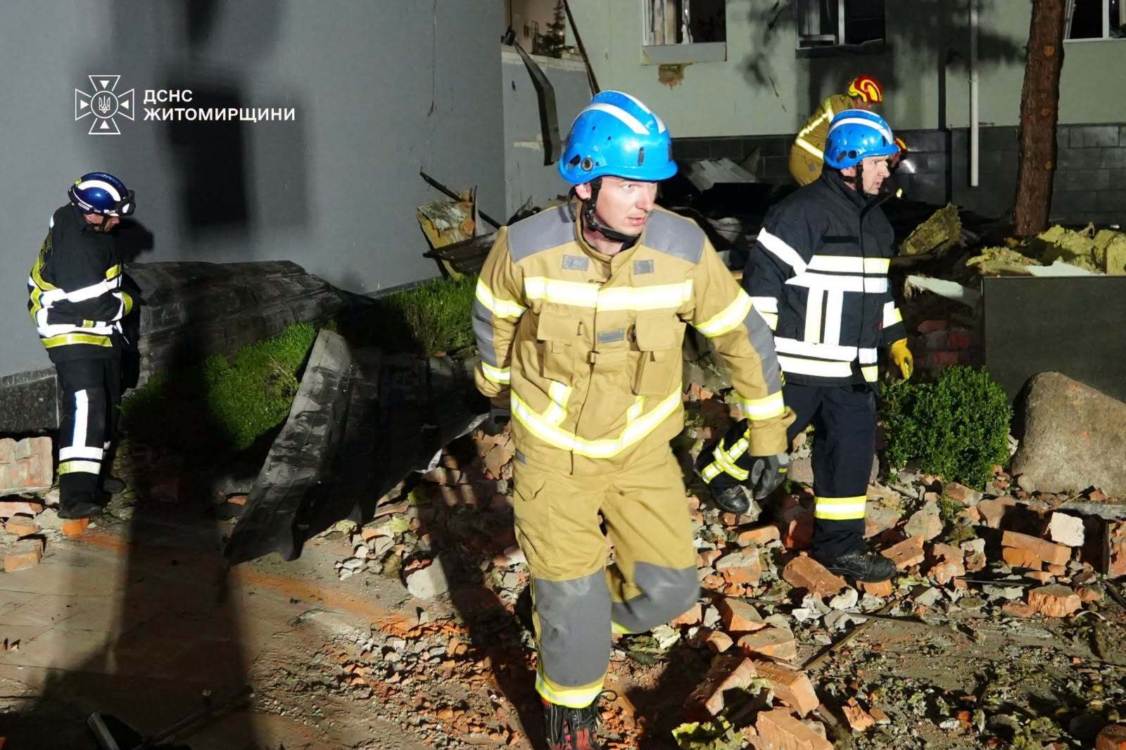 State Emergency Service rescuers at the site of the strike on the Zhytomyr police headquarters
