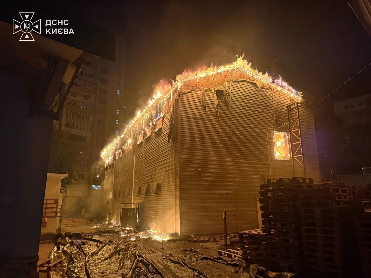 A warehouse fire in Kyiv after the overnight attack