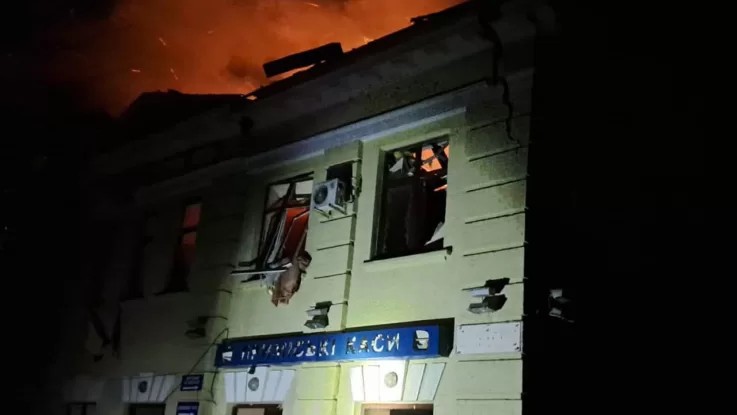 Fire engulfs part of the Lozova train station building following the overnight drone strike