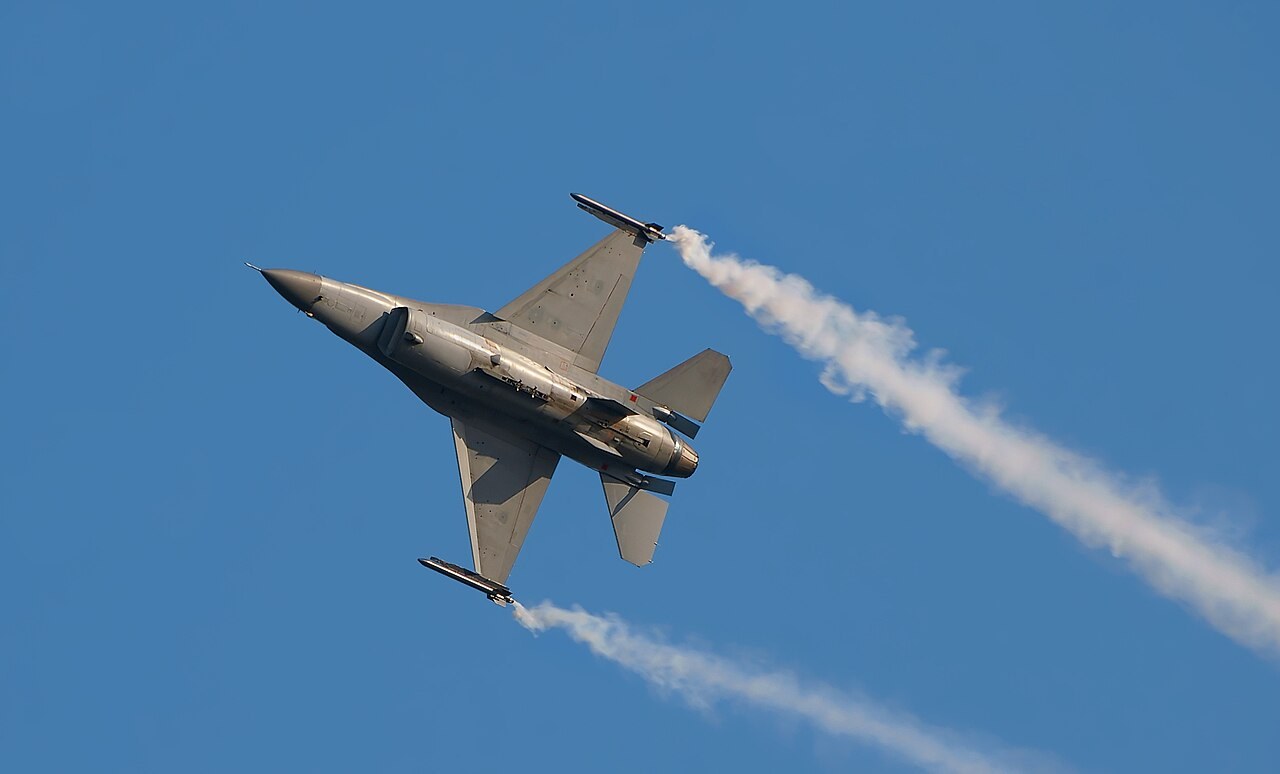Illustrative photo: an F-16 in the sky at an air show