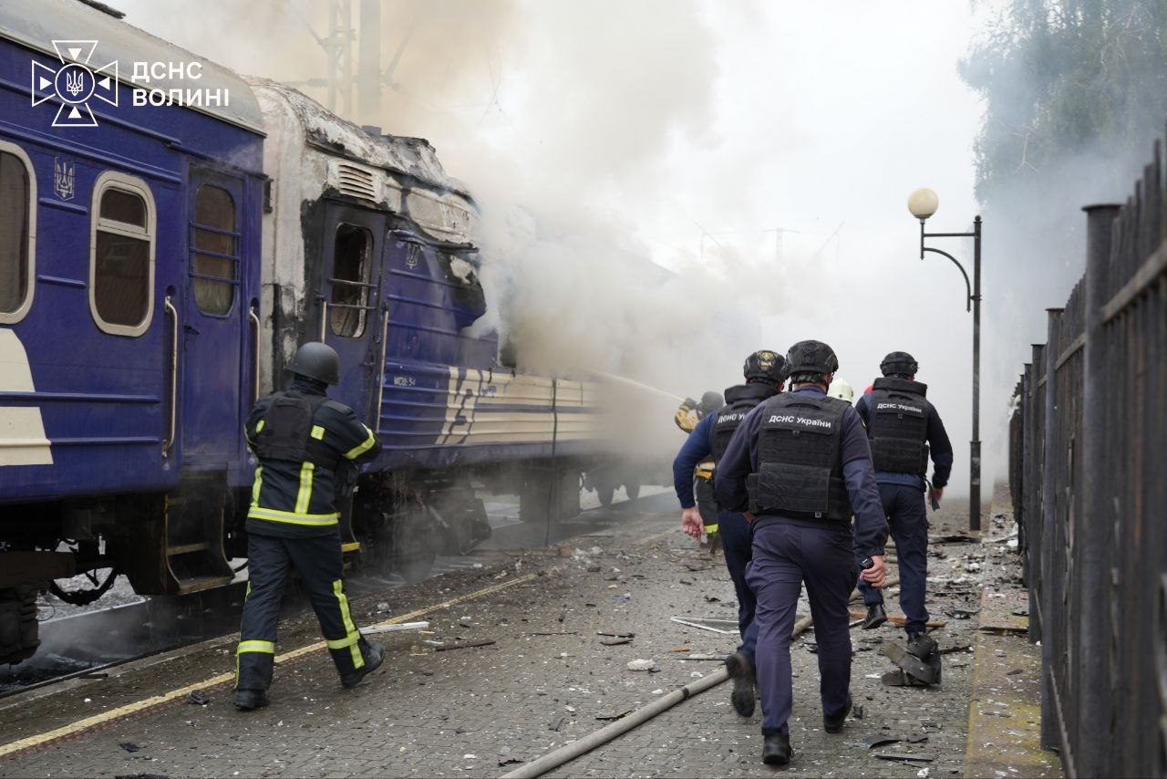 Ukraine's State Emergency Service crews work at the site of a strike on the railway station in Lutsk
