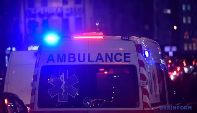 Illustrative photo: an ambulance responding to a call at night