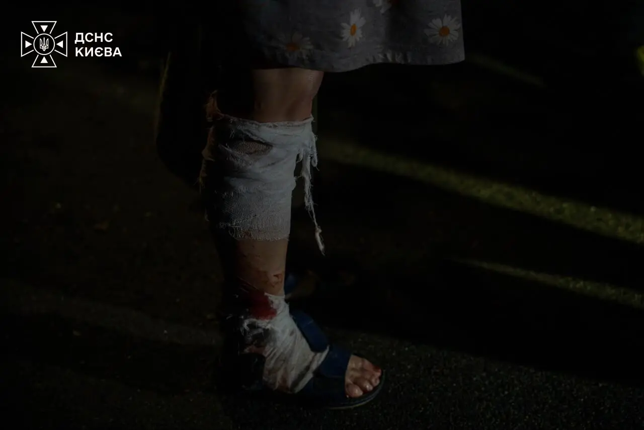One of the injured residents receiving help on site