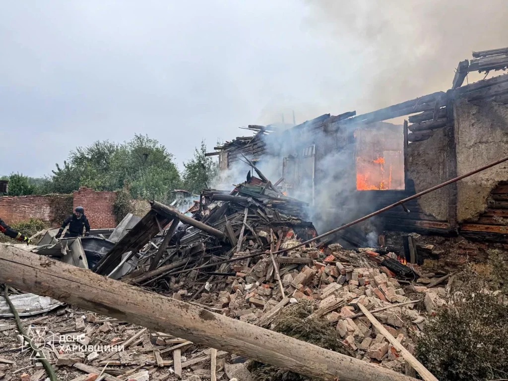 The aftermath of a fire following one of the strikes on Izyum's residential area