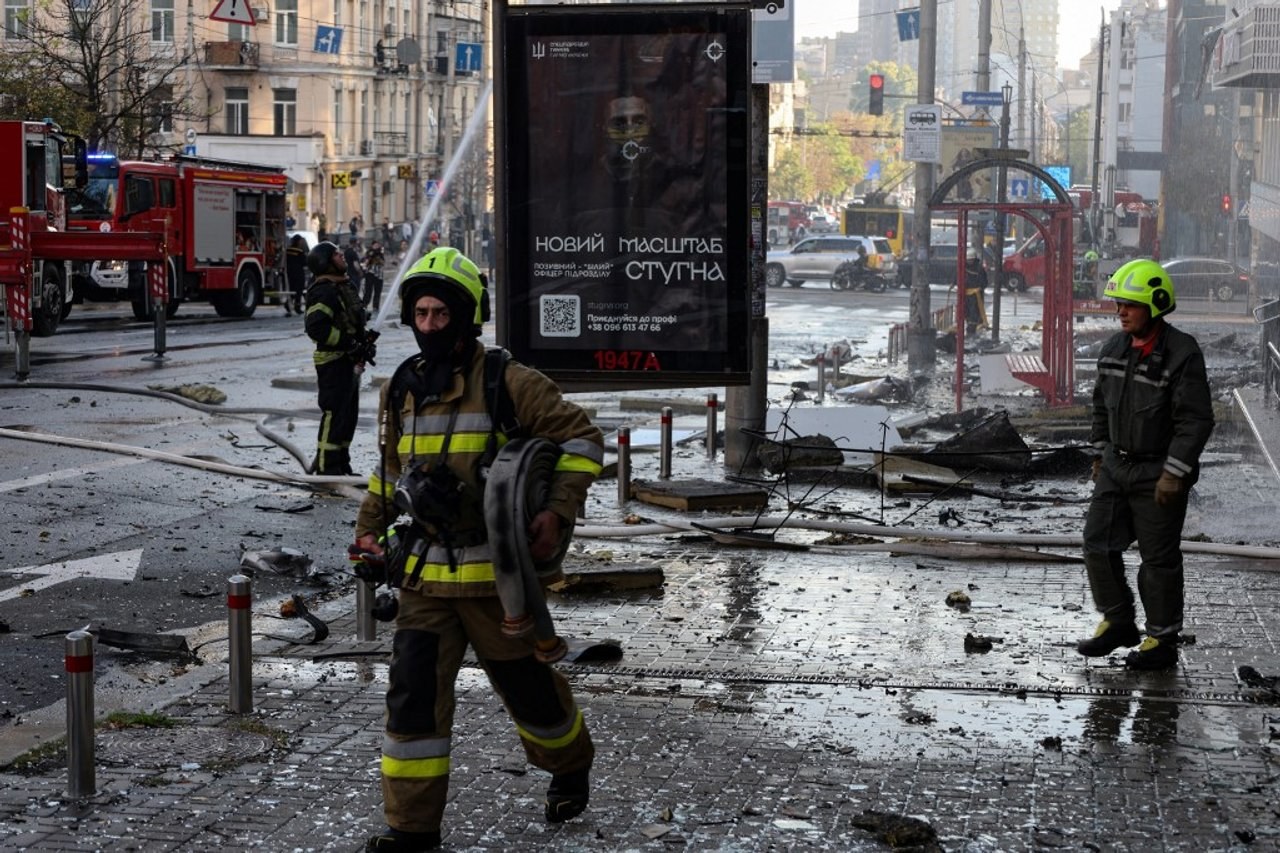 Rescuers at work at the aftermath of an attack on Kyiv
