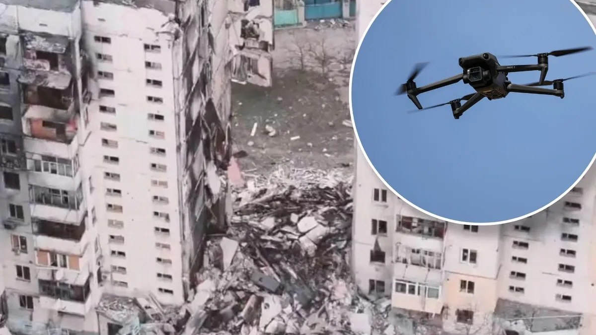 Illustrative photo: a drone above a wrecked apartment block