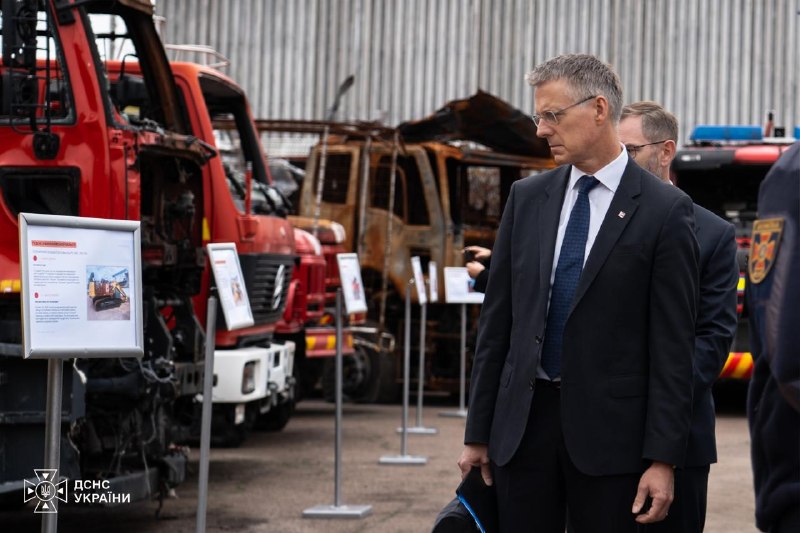 Damaged and burnt-out rescue vehicles displayed to the Norwegian guests
