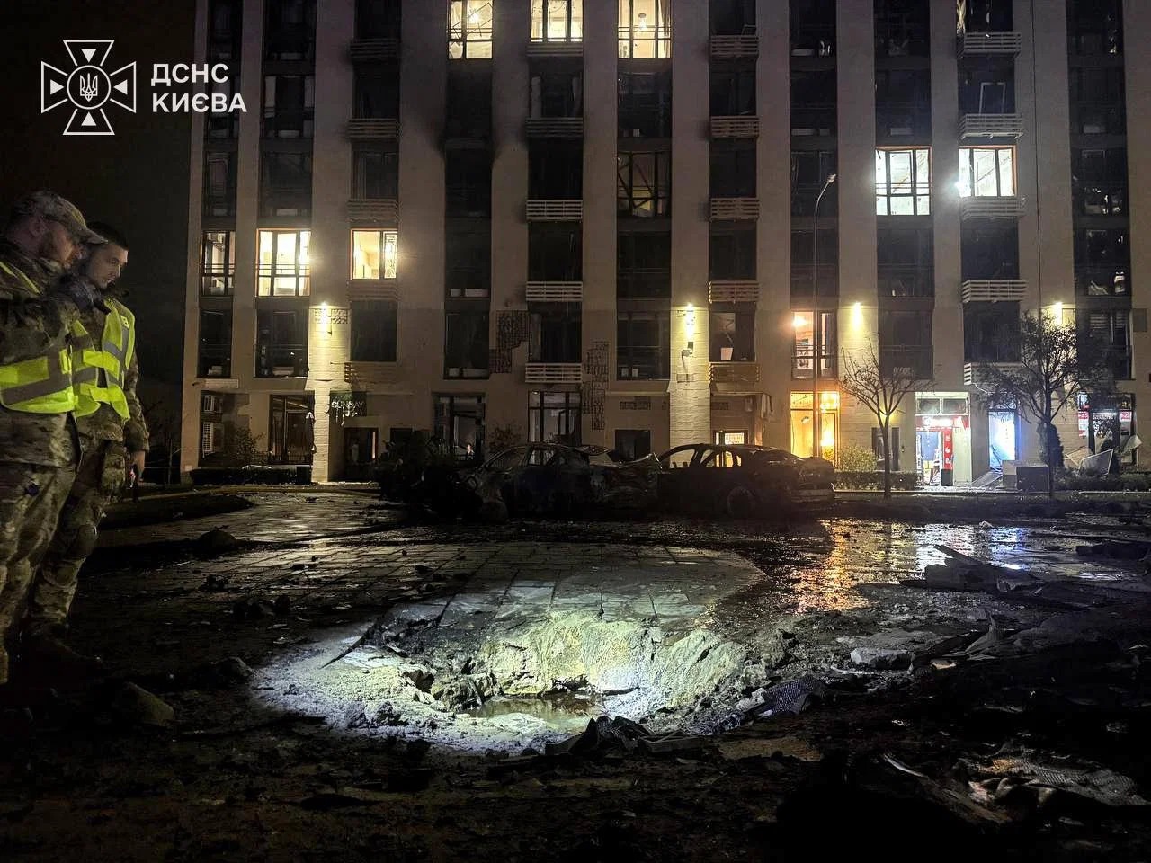 A crater in the courtyard of a residential building after a drone attack in Kyiv