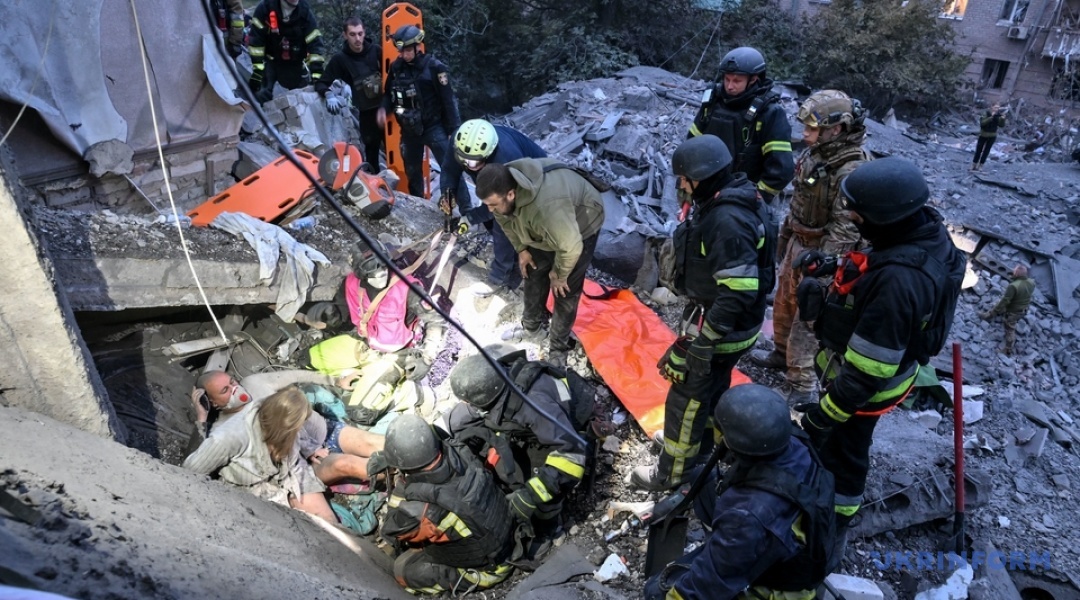 Rescuers working on the rubble of a building in Zaporizhzhia