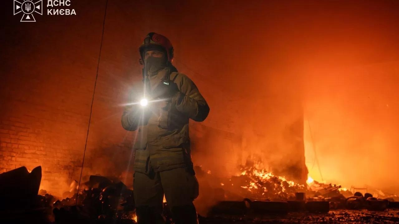 A State Emergency Service firefighter at the site of a warehouse fire in Kyiv after the overnight attack on 1 October. Photo: State Emergency Service of Kyiv