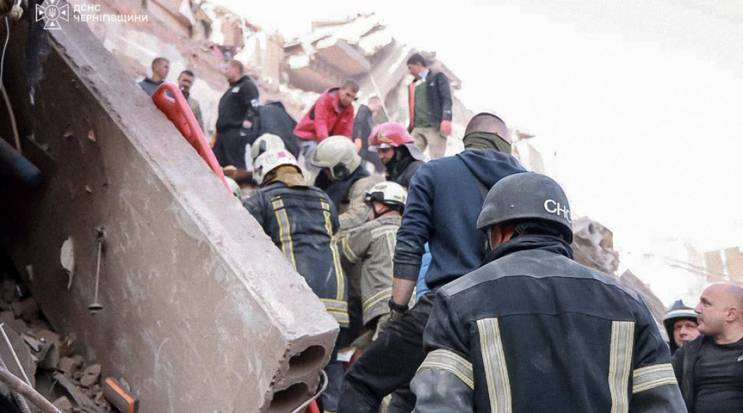 The ruined facade of a five-storey building in Pryluky after the missile strike