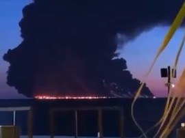 Oil burning on the water off the coast — image from social media