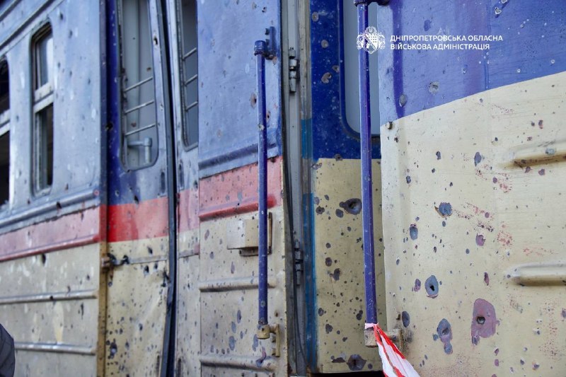 A train carriage with shrapnel marks along its side