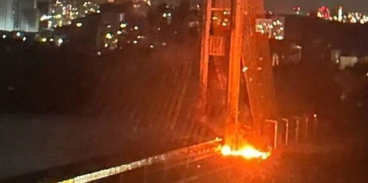 Fire near a support of the Southern Bridge (frame from reports at the scene)