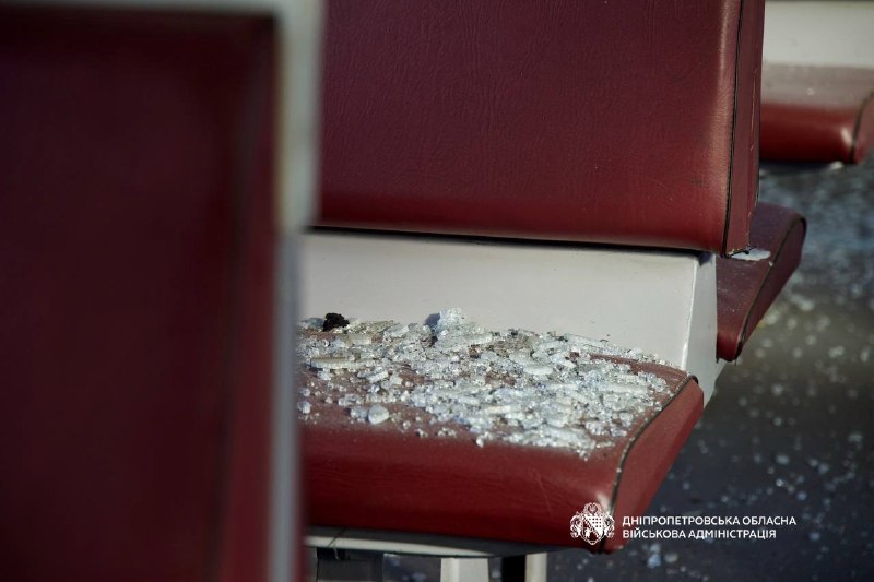 Broken glass on a seat inside the carriage
