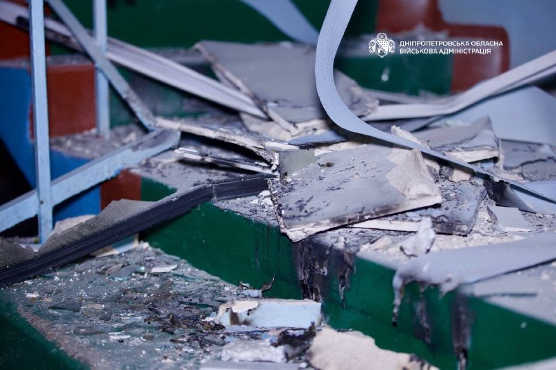 Wrecked structural elements and debris inside the damaged room